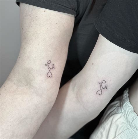 small mother and daughter tattoos|symbols for mother daughter bond.